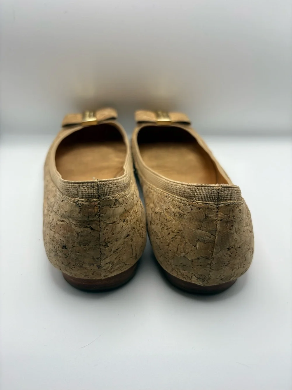 kate spade cork bow flats in tan with gold plaque